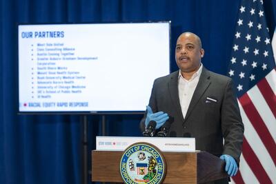 Carlos Nelson, Executive Director of the Greater Auburn-Gresham Development Corporation, speaks during a press conference to provide an update to the latest efforts by the Racial Equity Rapid Response Team, Monday April 20, 2020.