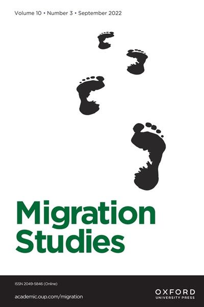 The book cover of Migration Studies. Footprints are depicted on it.