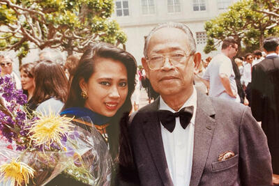 Khatharya Um is pictured here with her father at Berkeley in 1990 as she was the first Cambodian American woman to graduate with a Ph.D. in the country.